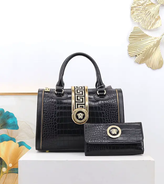 Luksuzna crna ženska torba Elanora Noir Lux sa zlatnim detaljima i krokodilskom teksturom
