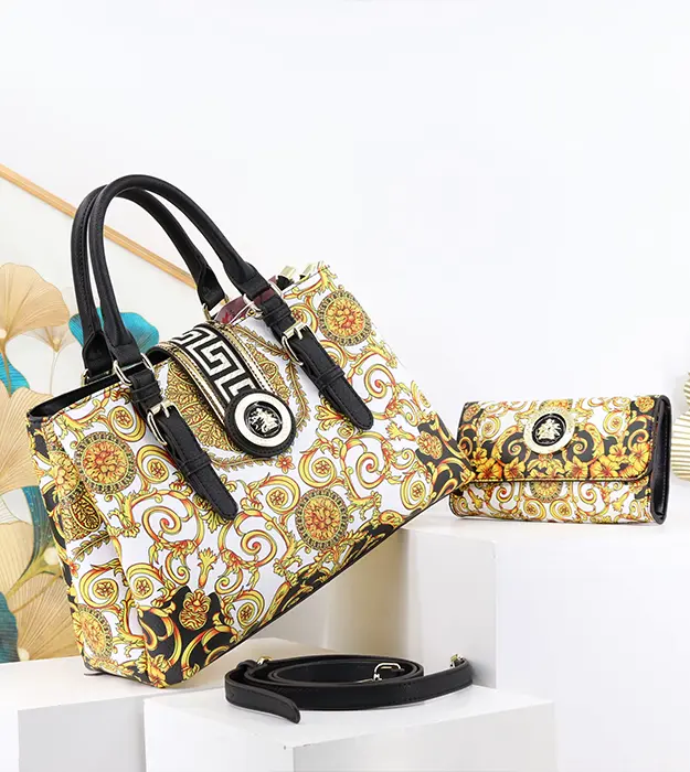 Elegantna ženska torba Florvelle Amara sa zlatno-belim floralnim motivima, postavljena na svetloj pozadini