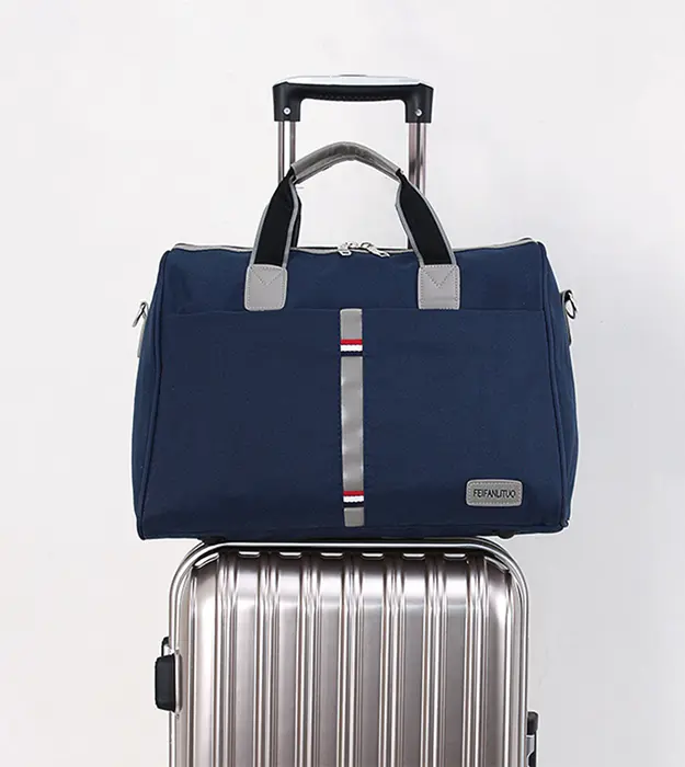 Traveline Marine – elegantna plava putna torba od Oxford materijala sa sivo-crnim ručkama